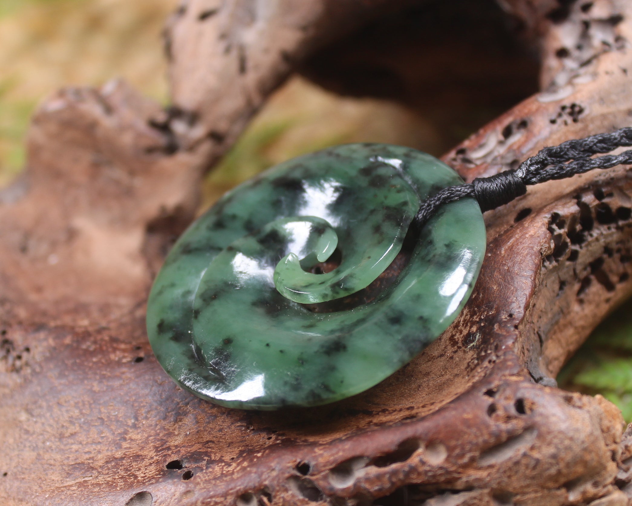 Koru carved from Rimu Pounamu - NZ Greenstone