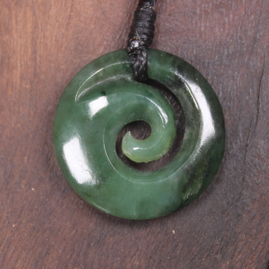 Koru pendant carved from Kawakawa Pounamu - NZ Greenstone