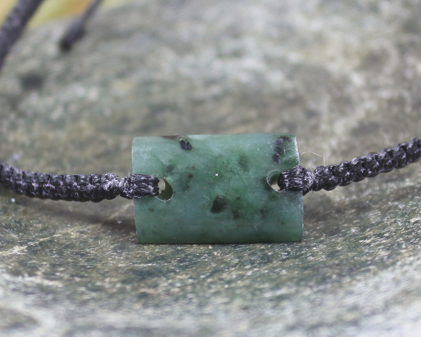 Adjustable cord bracelet with Rimu Pounamu