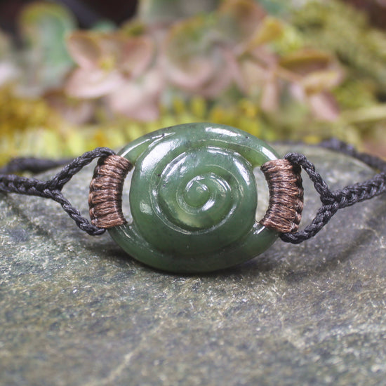 Adjustable cord bracelet with Hapopo Pounamu