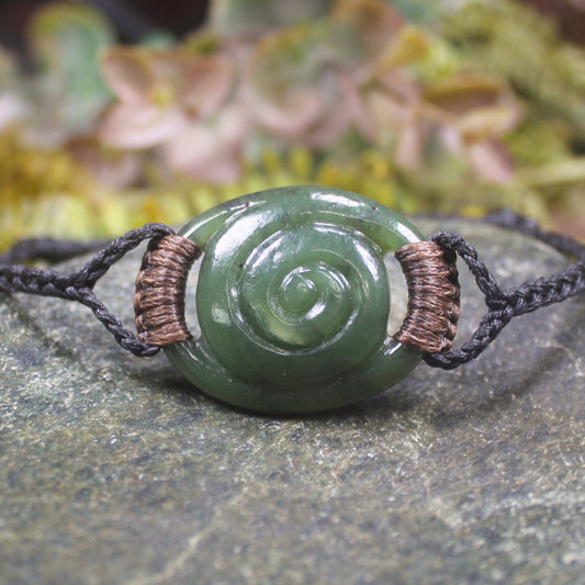 Adjustable cord bracelet with Hapopo Pounamu