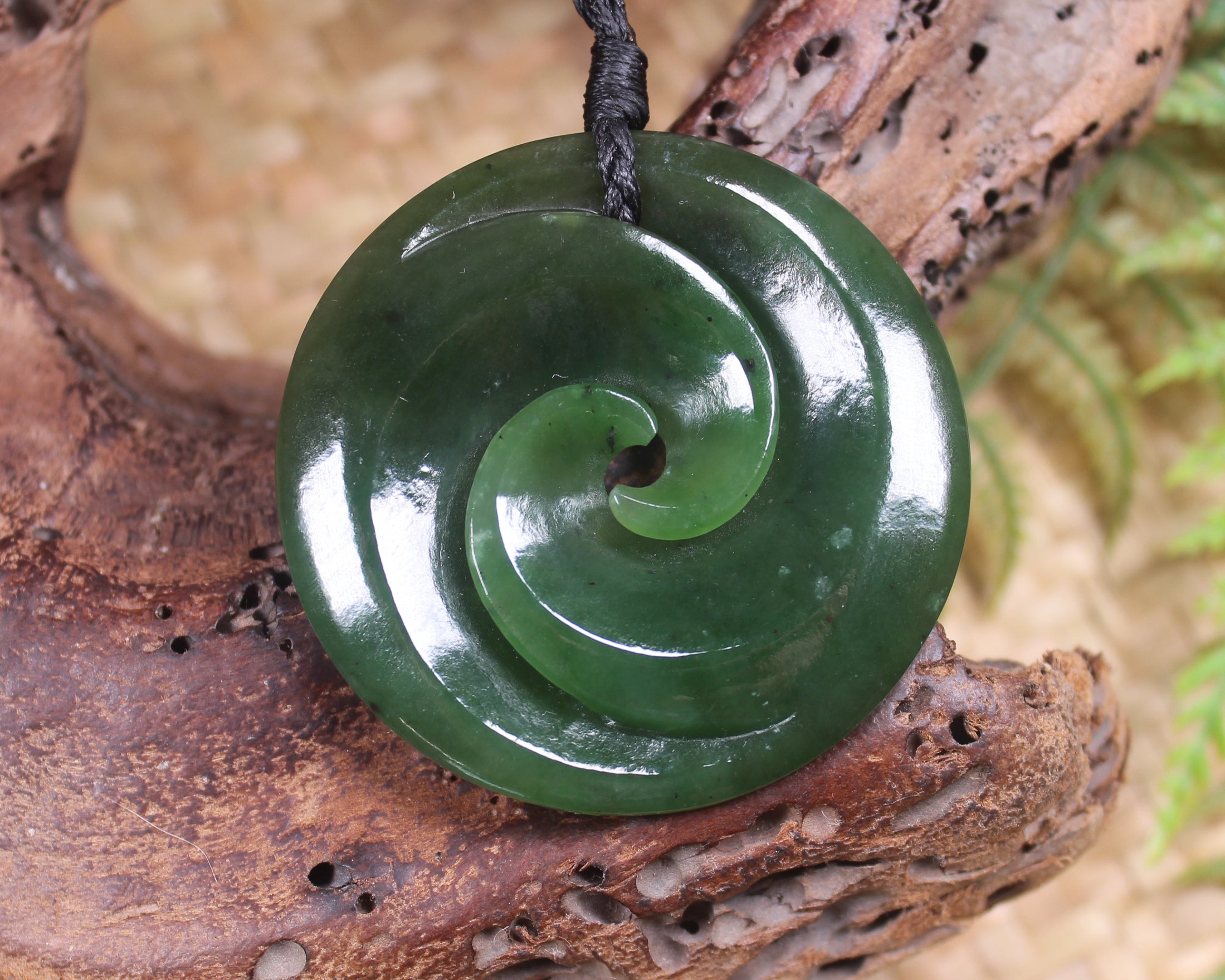 Koru pendant carved from Kawakawa Pounamu - NZ Greenstone