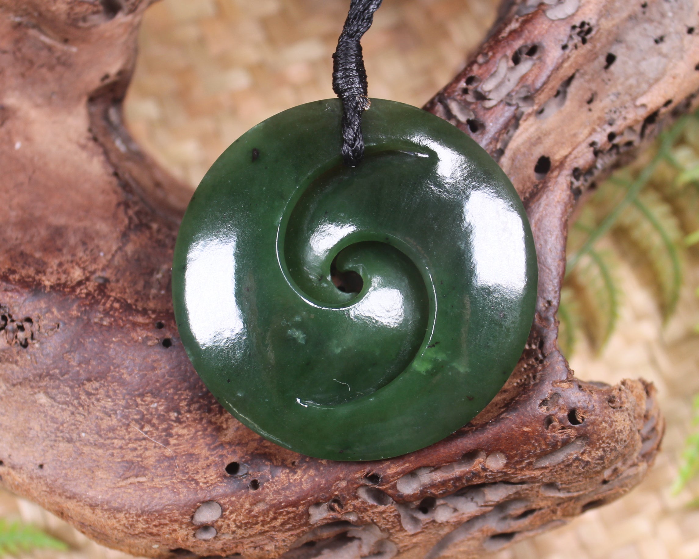 Koru pendant carved from Kawakawa Pounamu - NZ Greenstone