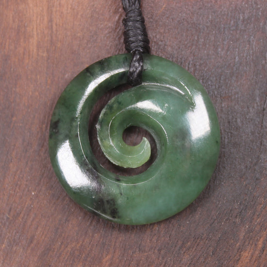 Koru pendant carved from Kawakawa Pounamu - NZ Greenstone