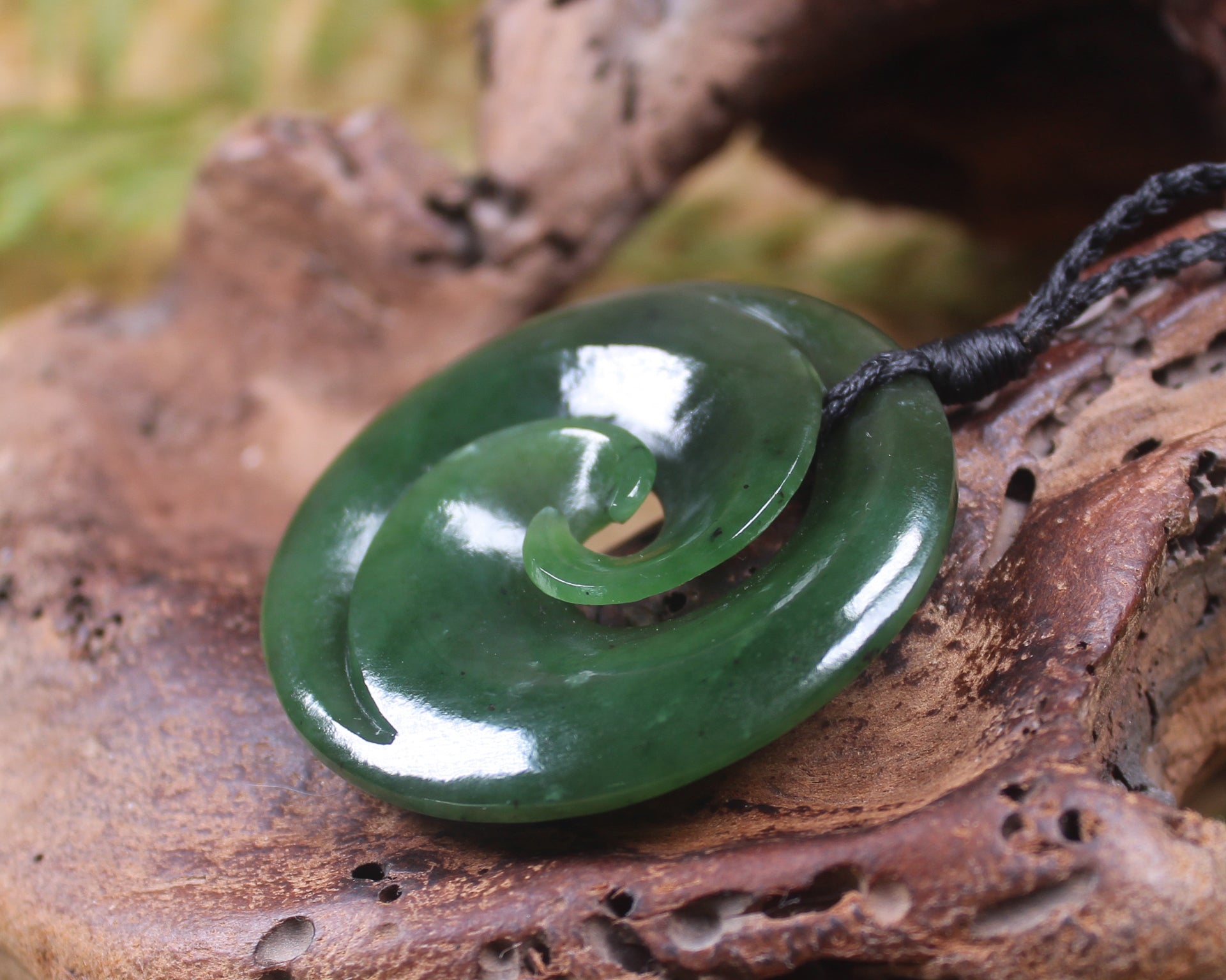 Koru pendant carved from Kawakawa Pounamu - NZ Greenstone