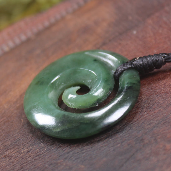 Koru pendant carved from Kawakawa Pounamu - NZ Greenstone
