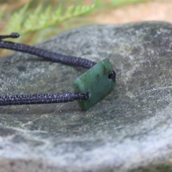 Adjustable cord bracelet with Rimu Pounamu