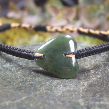 Adjustable cord bracelet with Hapopo Pounamu