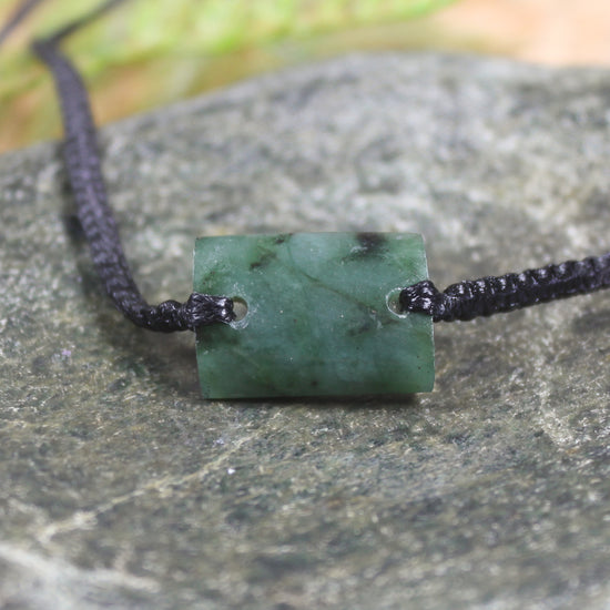 Adjustable cord bracelet with Rimu Pounamu
