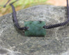 Adjustable cord bracelet with Rimu Pounamu