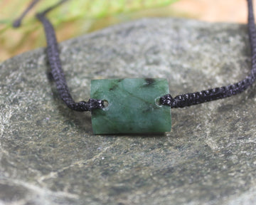 Adjustable cord bracelet with Rimu Pounamu