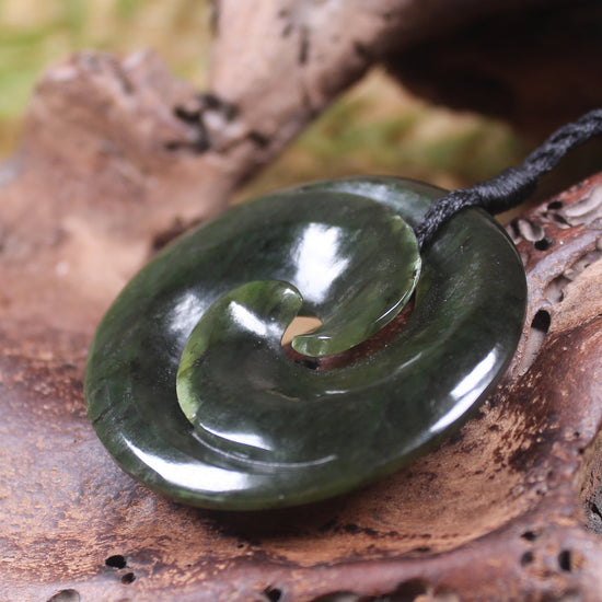Koru carved from Rimu Pounamu - NZ Greenstone