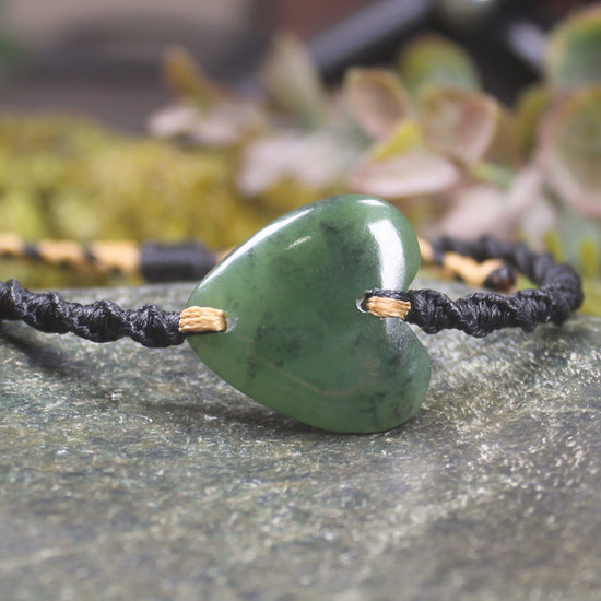 Adjustable cord bracelet with Hapopo Pounamu