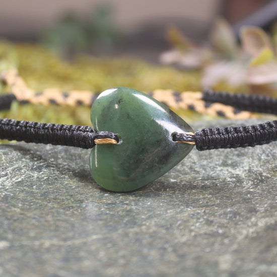 Adjustable cord bracelet with Hapopo Pounamu