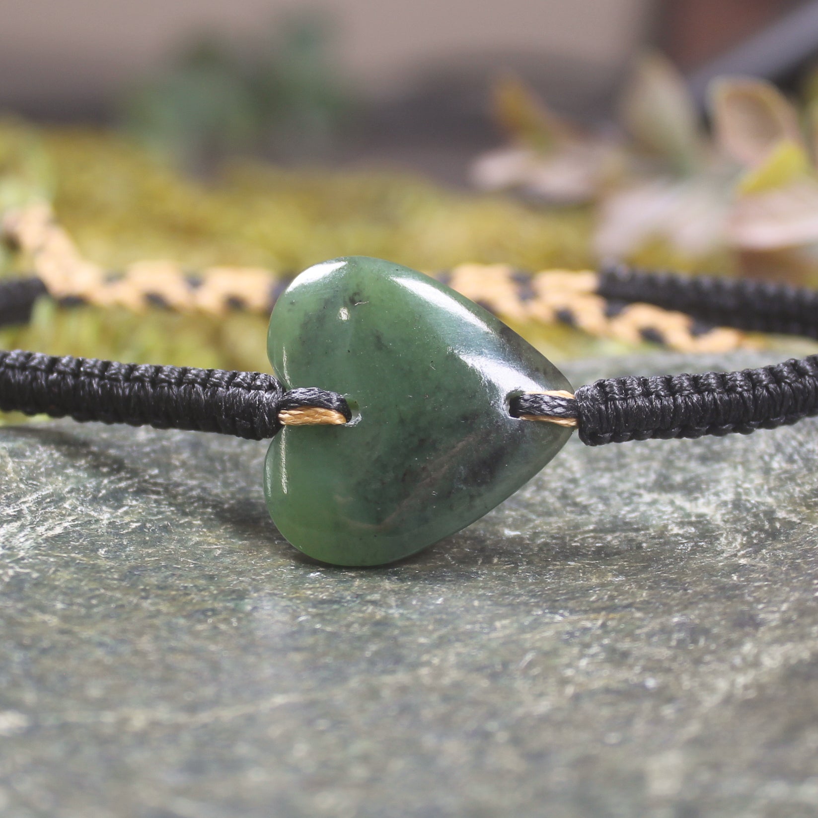 Adjustable cord bracelet with Hapopo Pounamu