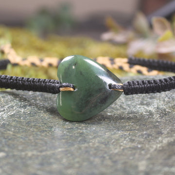 Adjustable cord bracelet with Hapopo Pounamu