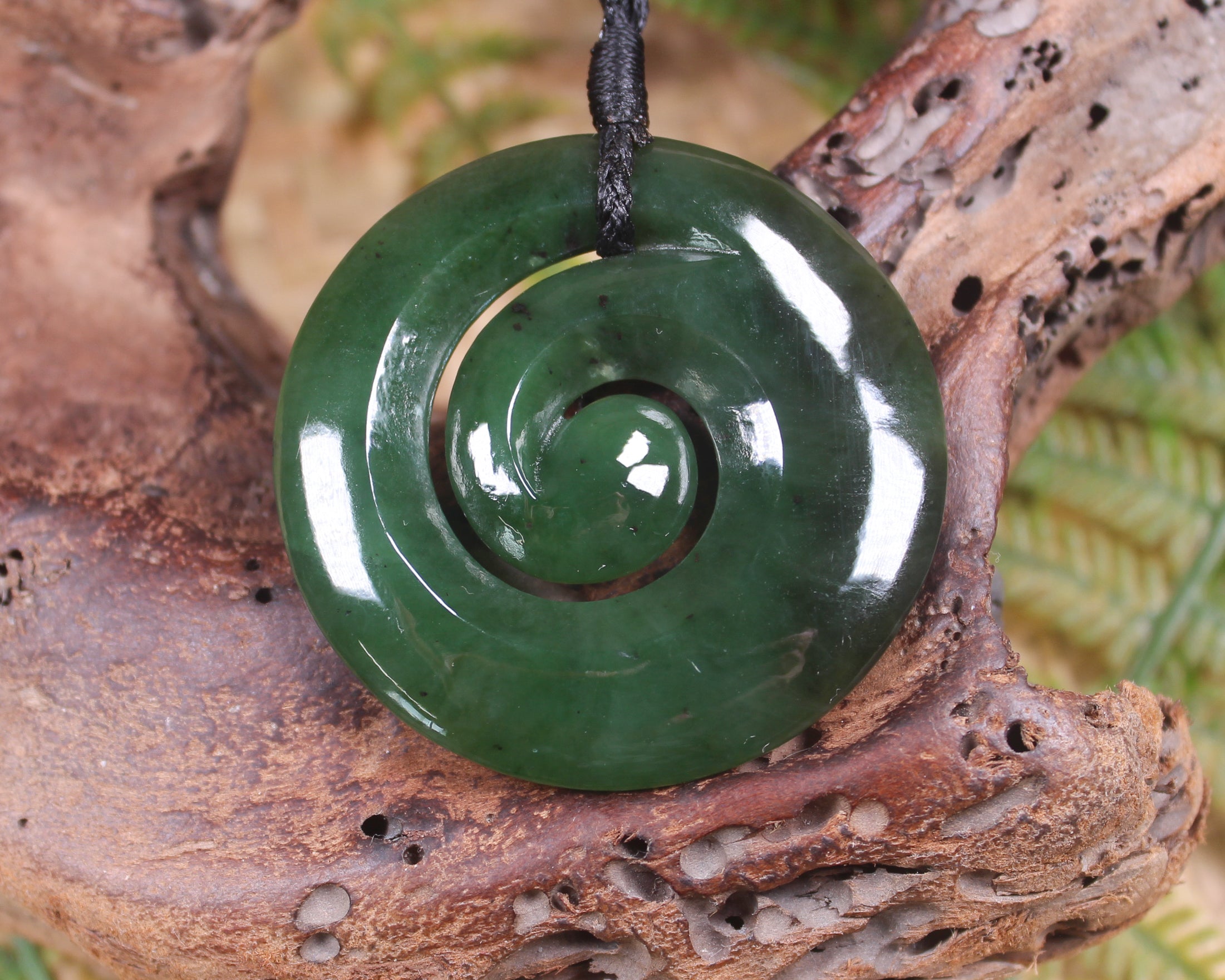 Koru pendant carved from Kawakawa Pounamu - NZ Greenstone