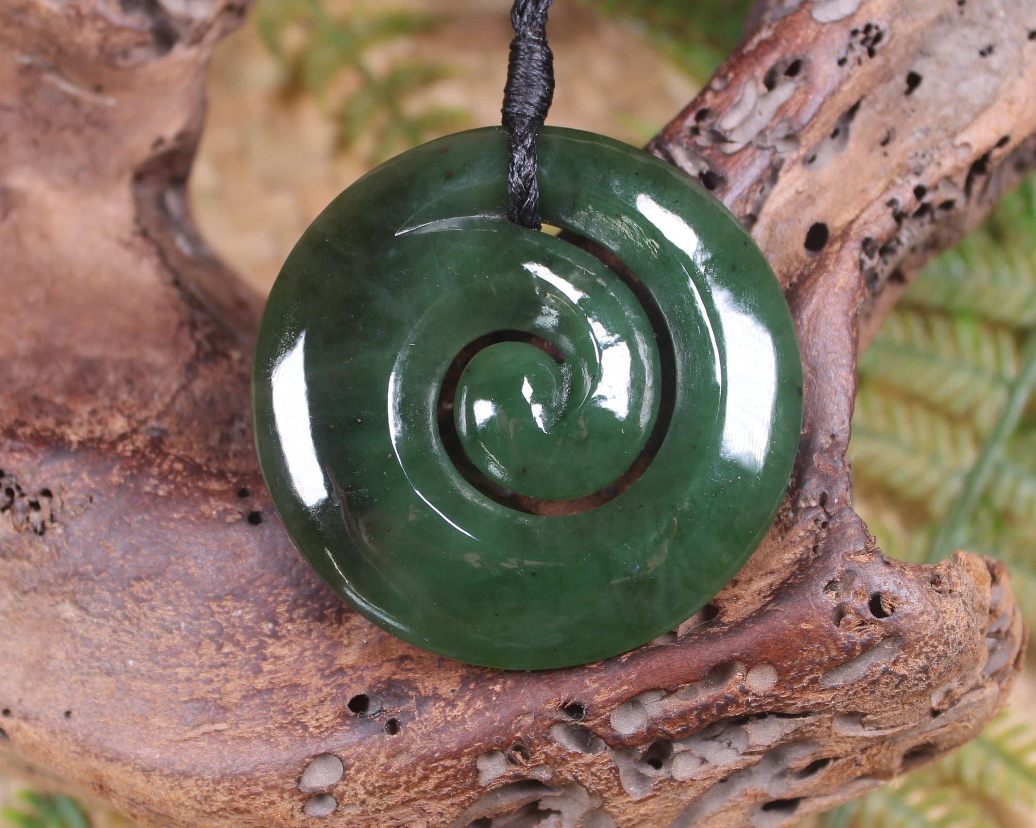 Koru pendant carved from Kawakawa Pounamu - NZ Greenstone