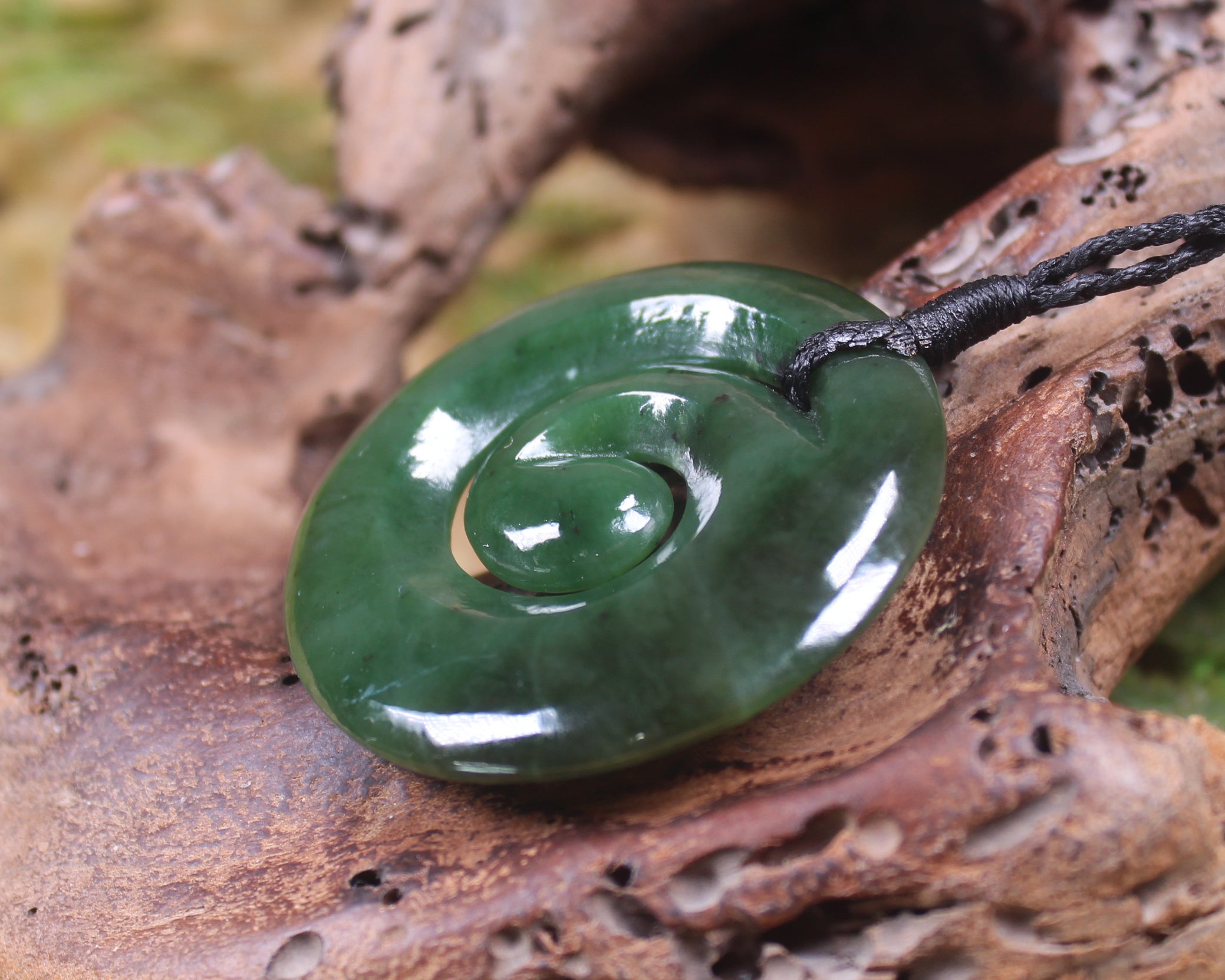 Koru pendant carved from Kawakawa Pounamu - NZ Greenstone