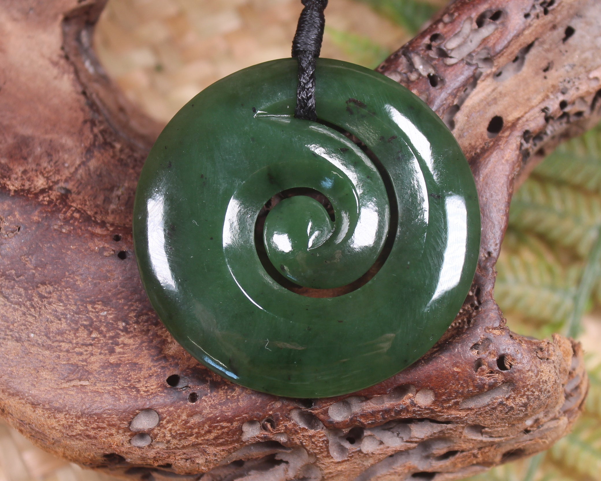 Koru pendant carved from Kawakawa Pounamu - NZ Greenstone