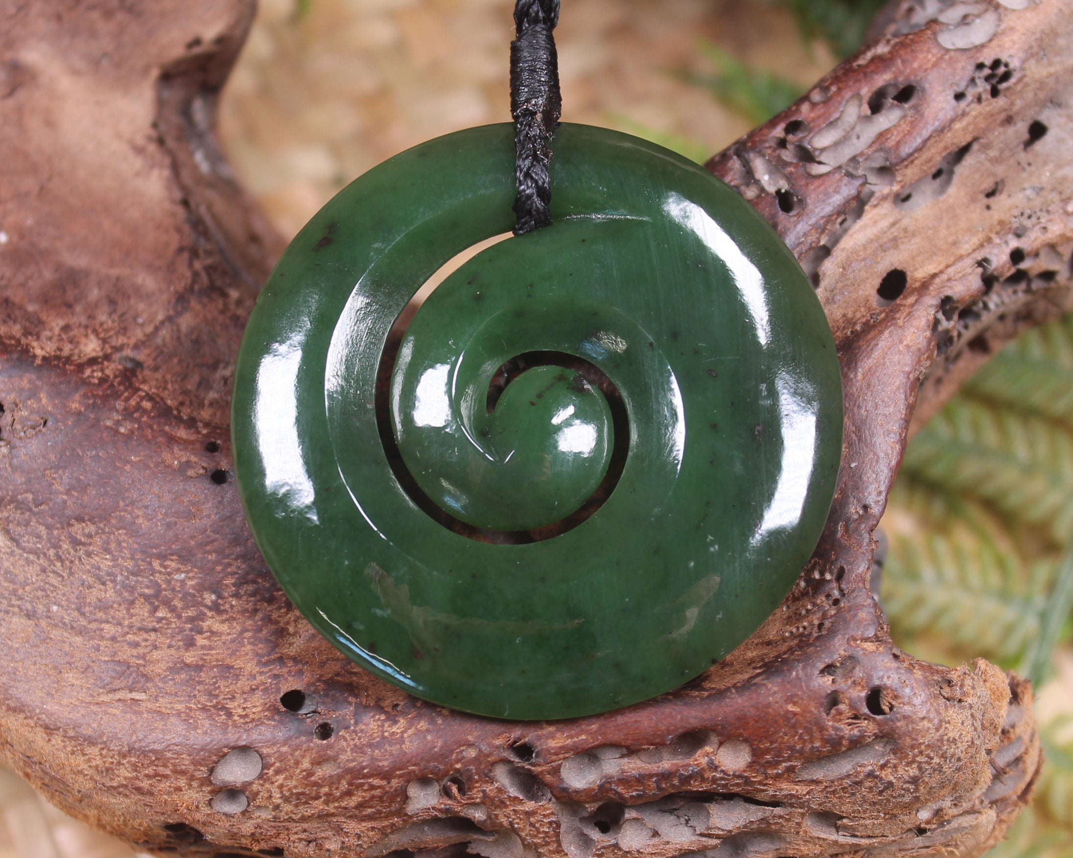 Koru pendant carved from Kawakawa Pounamu - NZ Greenstone