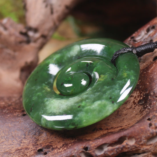 Koru pendant carved from Kawakawa Pounamu - NZ Greenstone