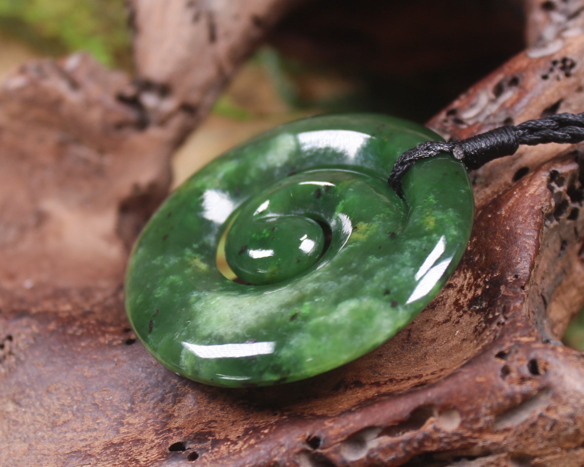 Koru pendant carved from Kawakawa Pounamu - NZ Greenstone