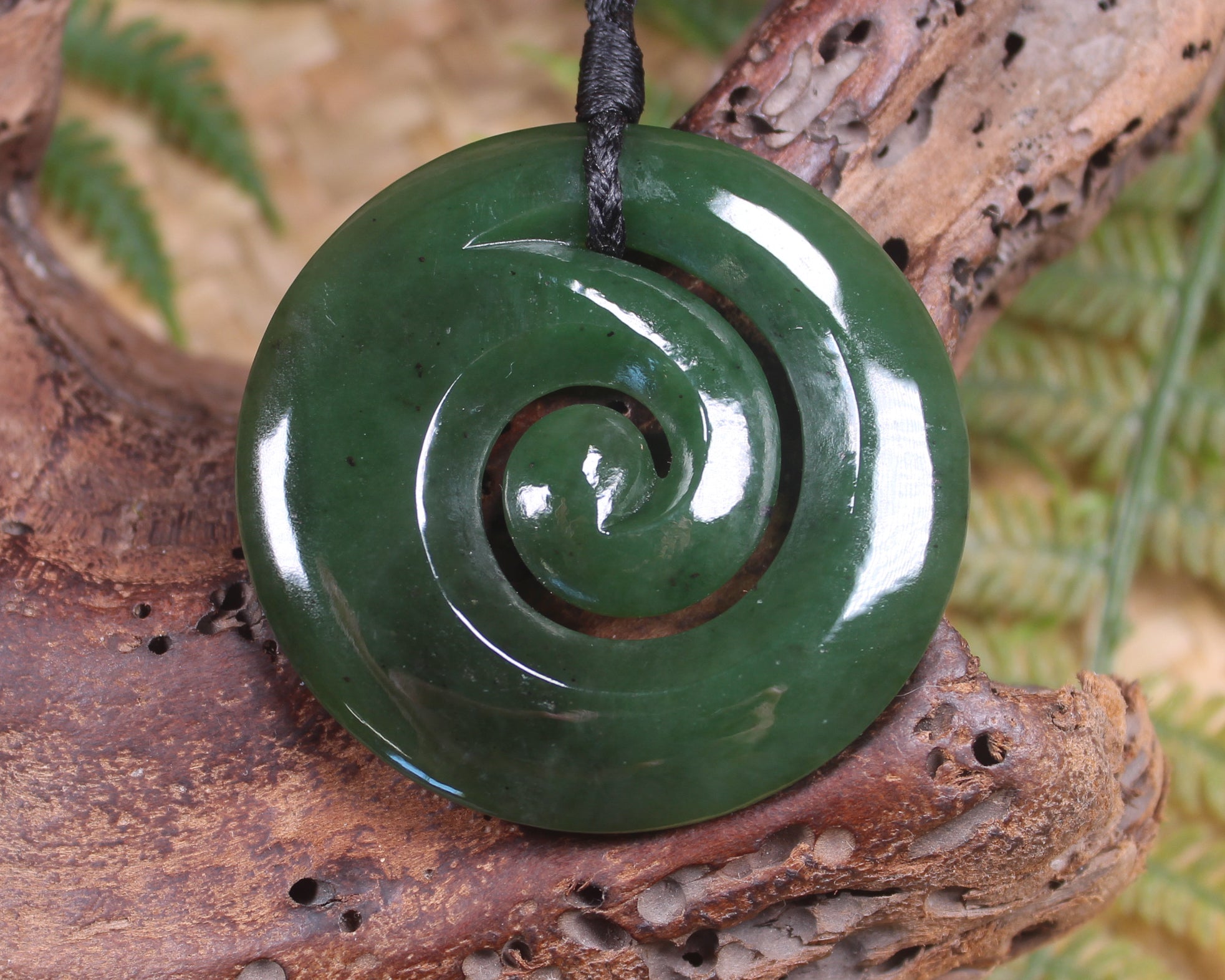 Koru pendant carved from Kawakawa Pounamu - NZ Greenstone