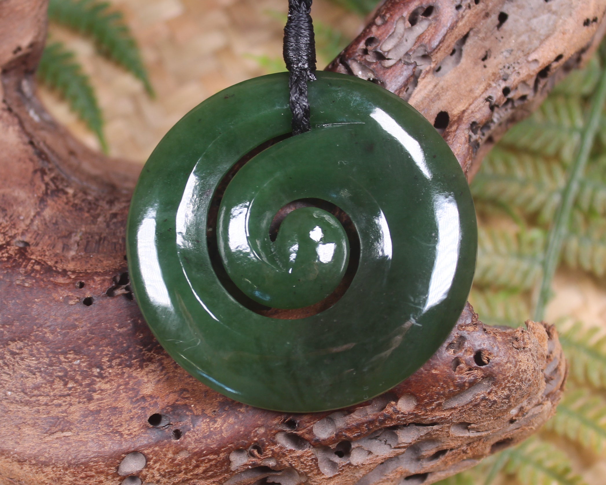 Koru pendant carved from Kawakawa Pounamu - NZ Greenstone