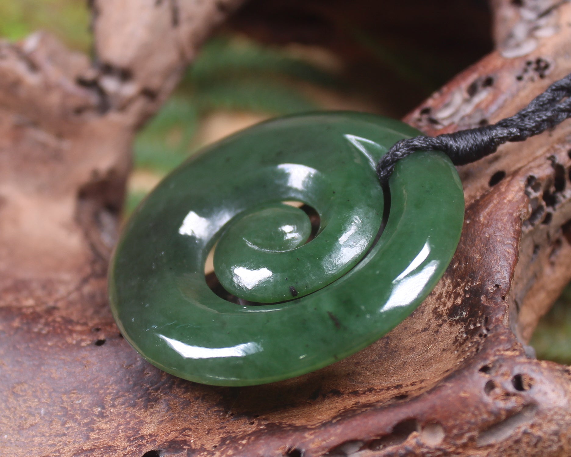 Koru pendant carved from Kawakawa Pounamu - NZ Greenstone