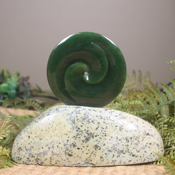 Koru sculpture carved from Kawakawa Pounamu - NZ Greenstone