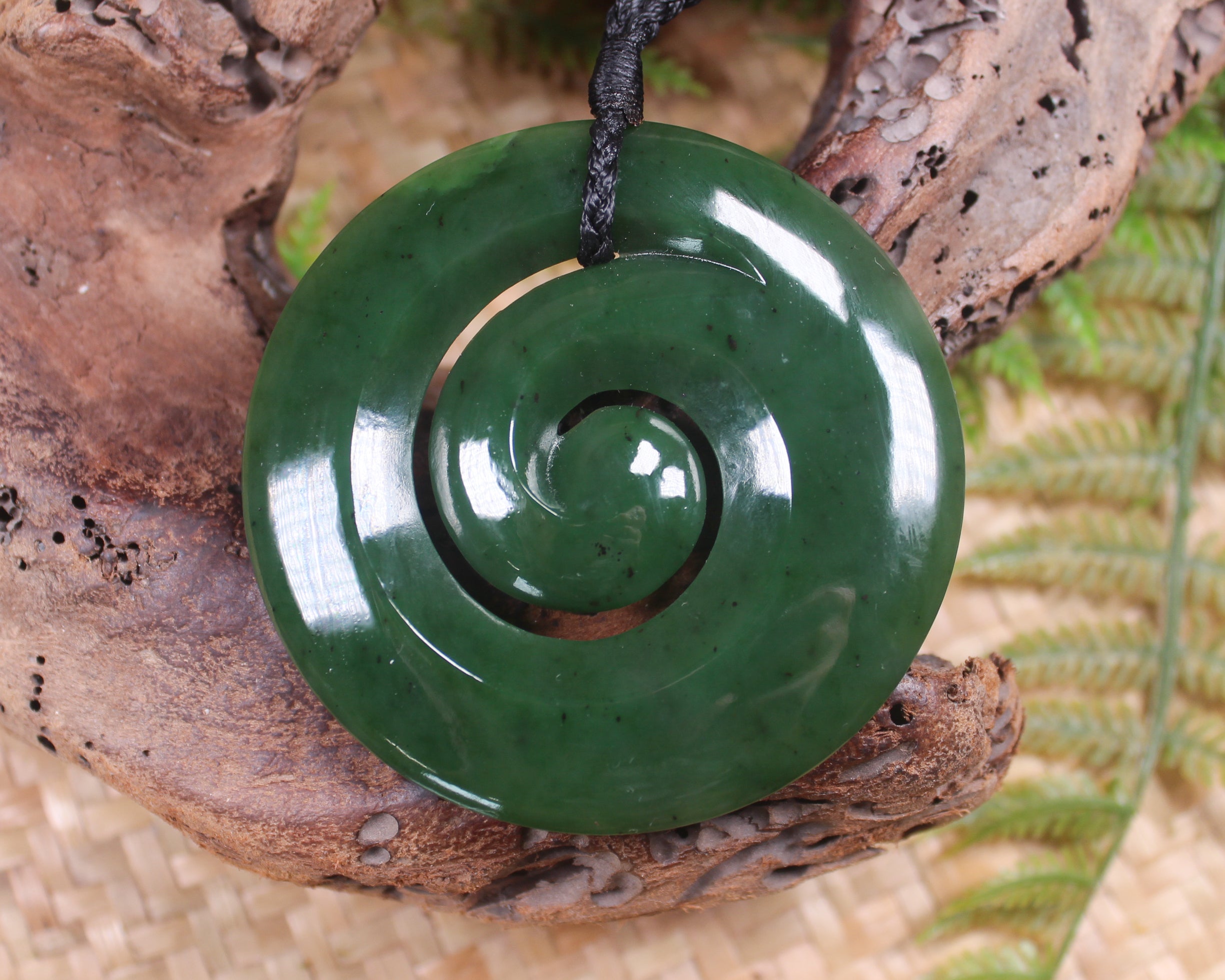 Koru pendant carved from Kawakawa Pounamu - NZ Greenstone