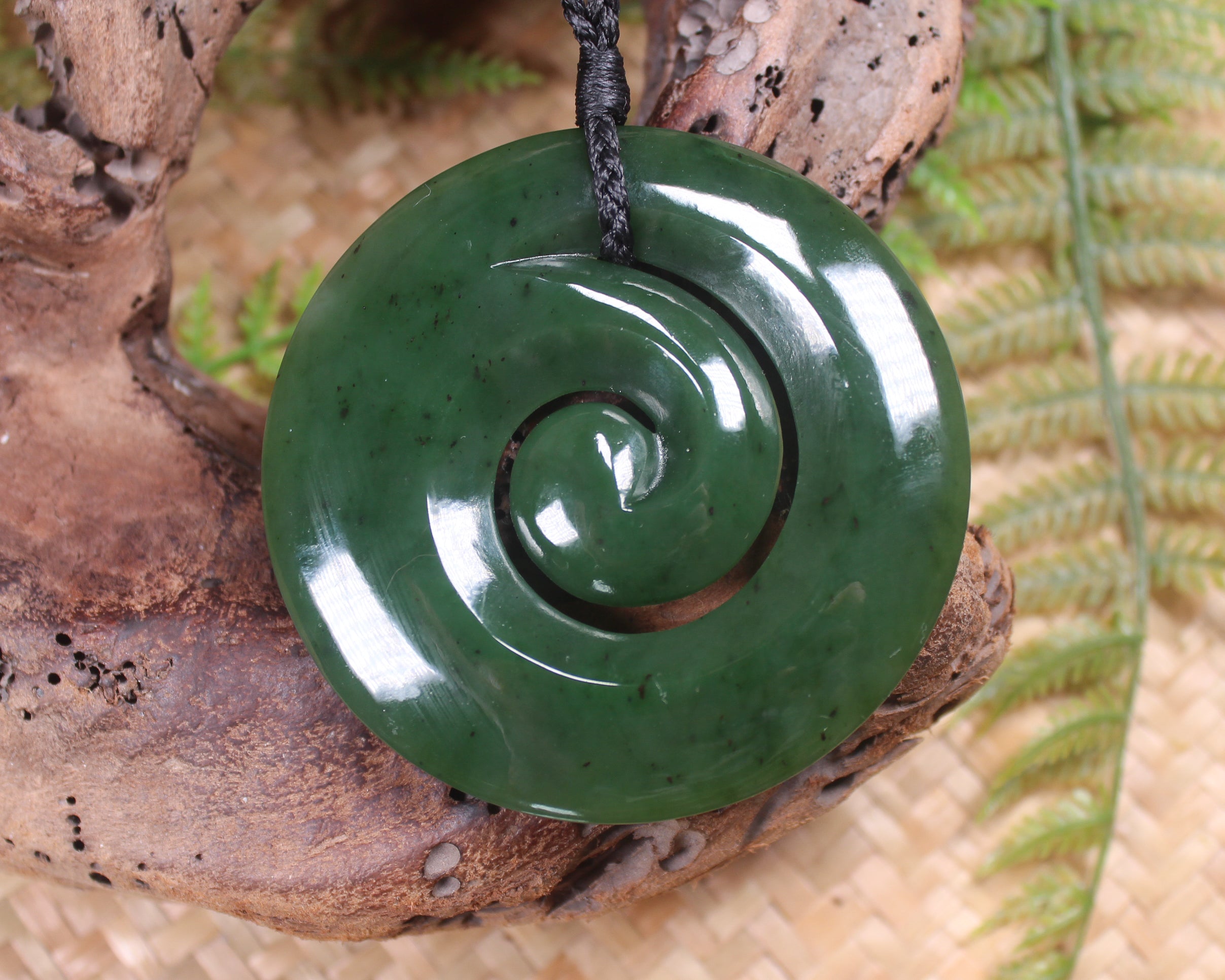 Koru pendant carved from Kawakawa Pounamu - NZ Greenstone