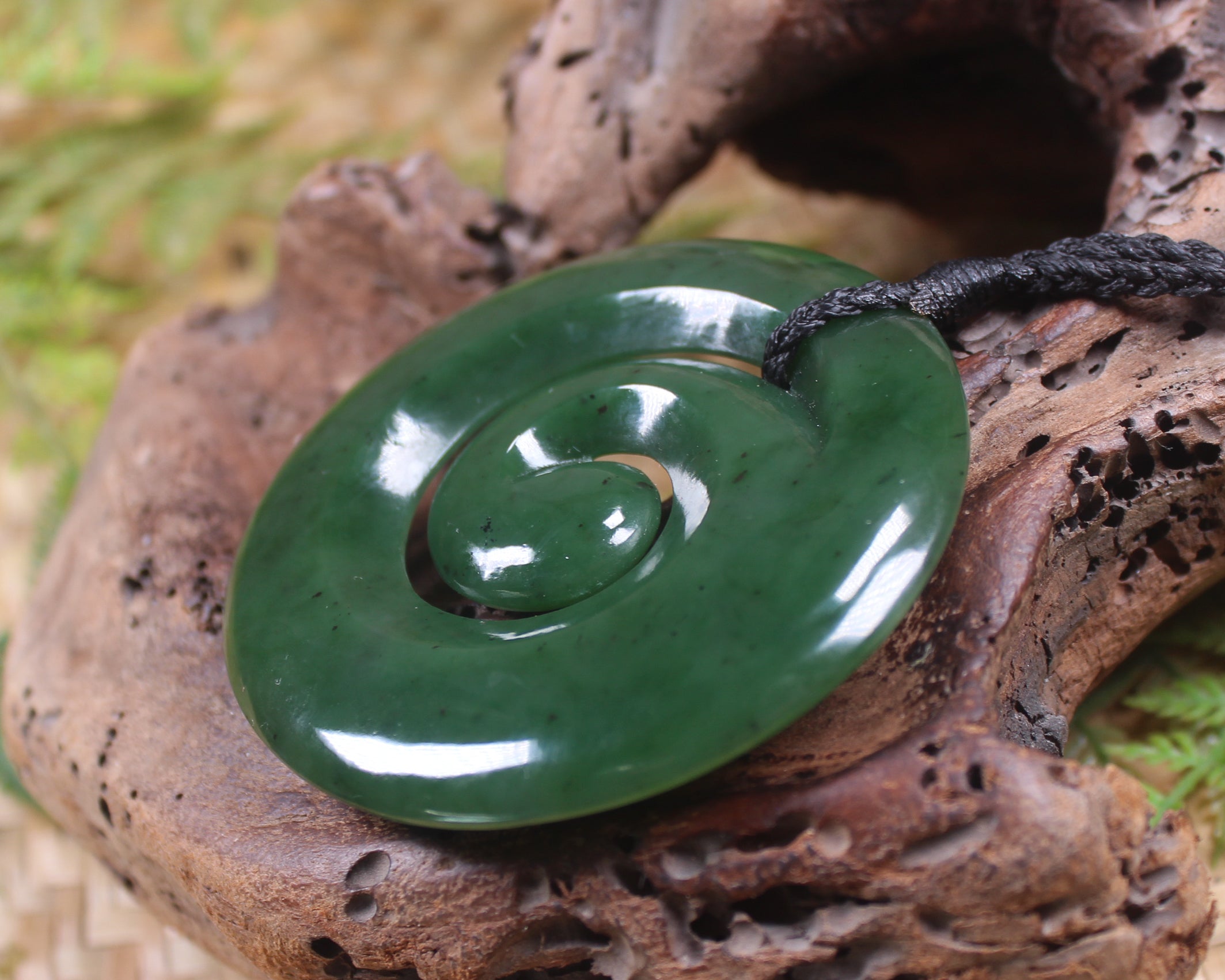 Koru pendant carved from Kawakawa Pounamu - NZ Greenstone