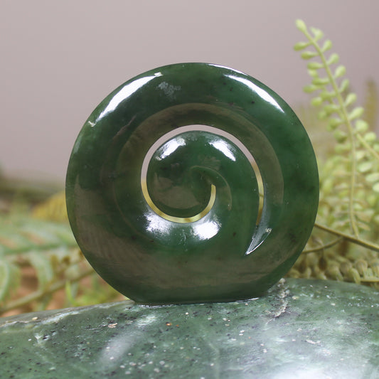 Koru sculpture carved from Kawakawa Pounamu - NZ Greenstone