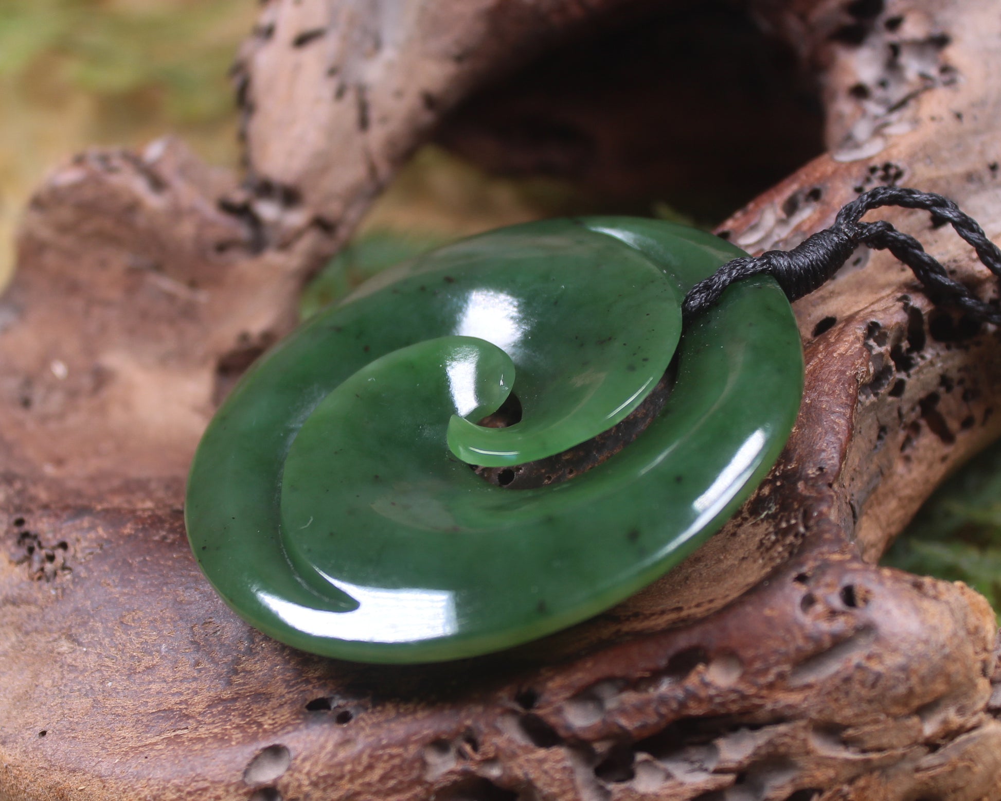 Koru pendant carved from Kawakawa Pounamu - NZ Greenstone