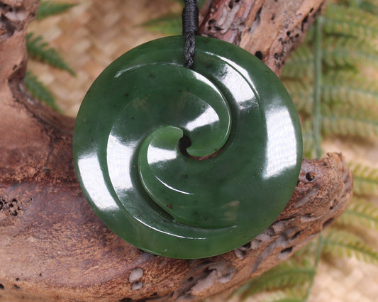 Koru pendant carved from Kawakawa Pounamu - NZ Greenstone