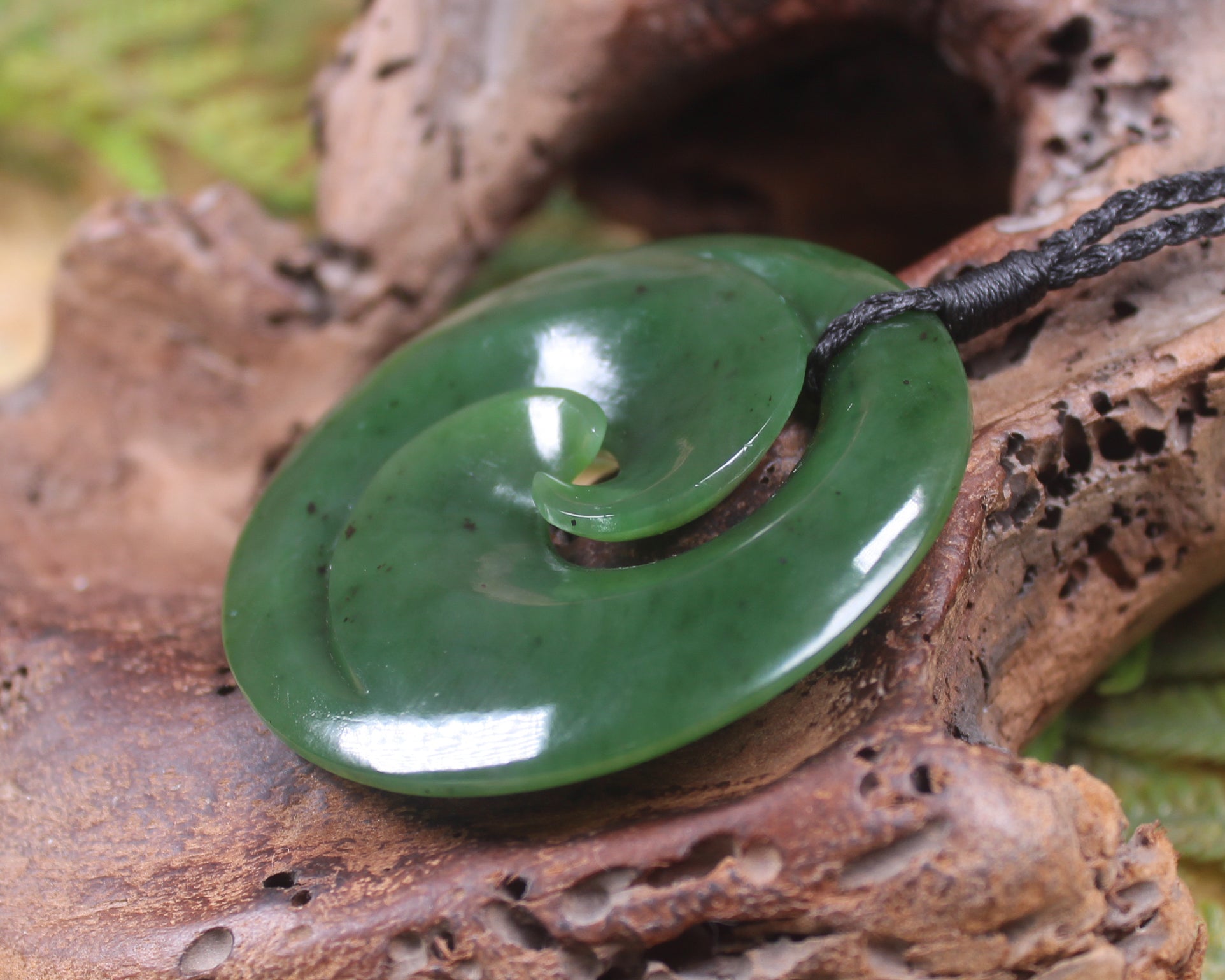 Koru pendant carved from Kawakawa Pounamu - NZ Greenstone