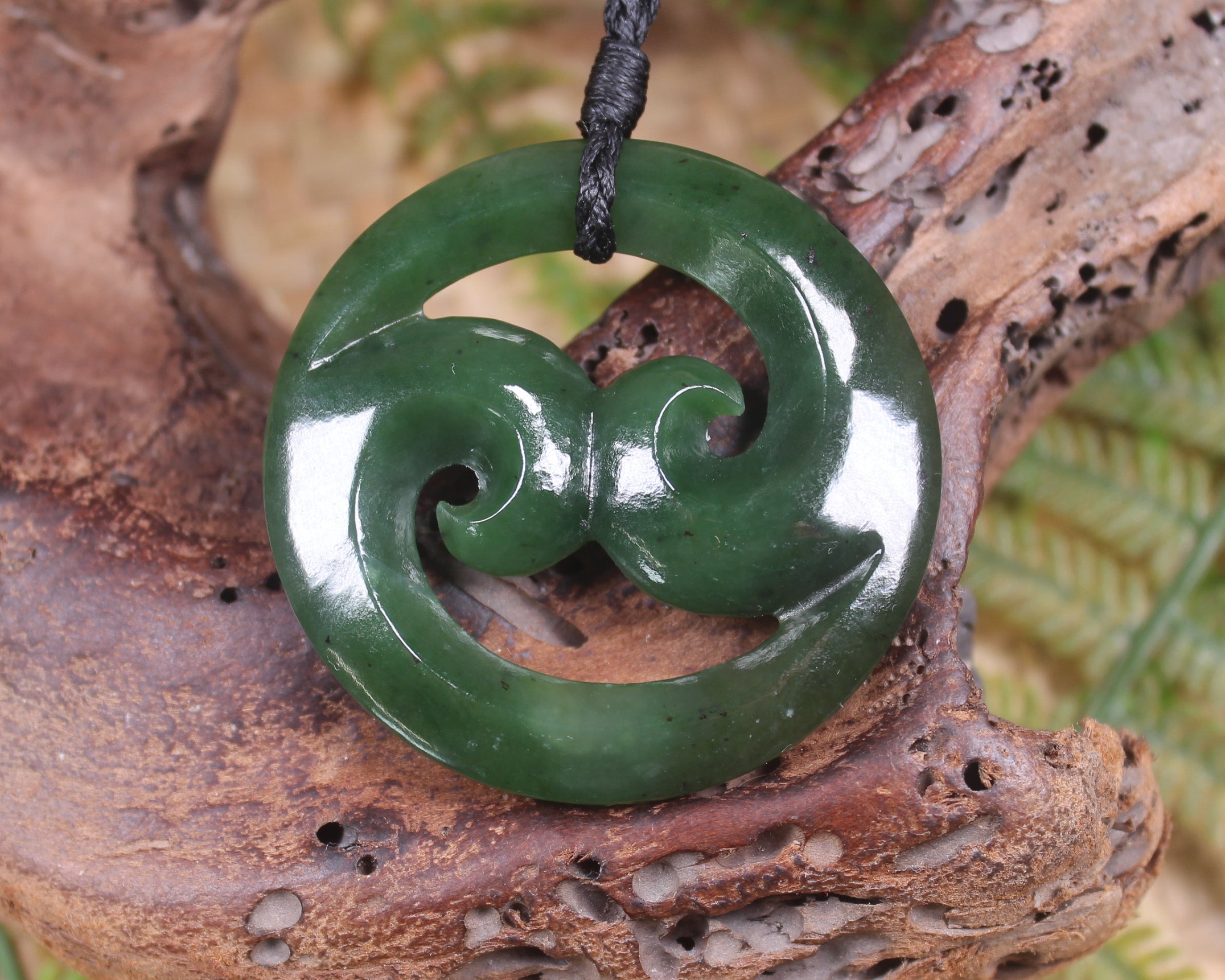 Koru pendant carved from Kawakawa Pounamu - NZ Greenstone