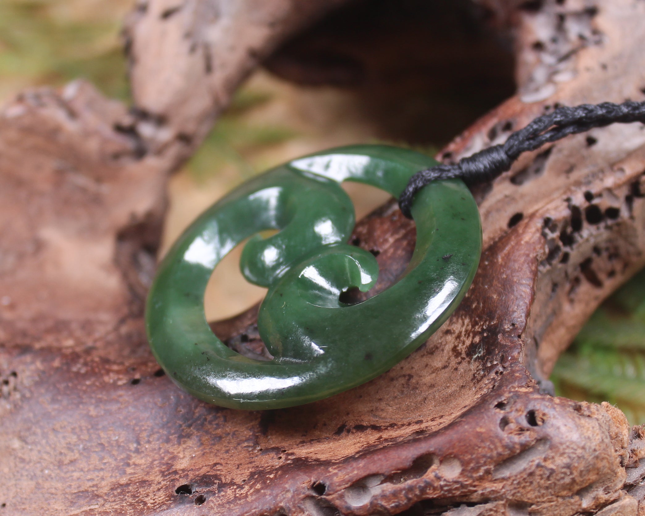 Koru pendant carved from Kawakawa Pounamu - NZ Greenstone