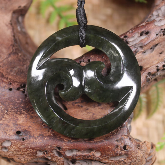 Koru carved from Rimu Pounamu - NZ Greenstone