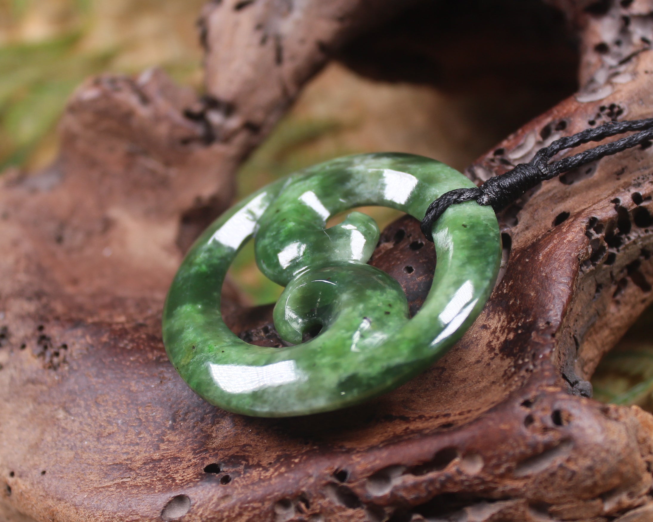 Koru pendant carved from Kawakawa Pounamu - NZ Greenstone