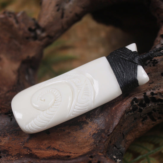Toki or Adze with Koru carved from Beef Bone