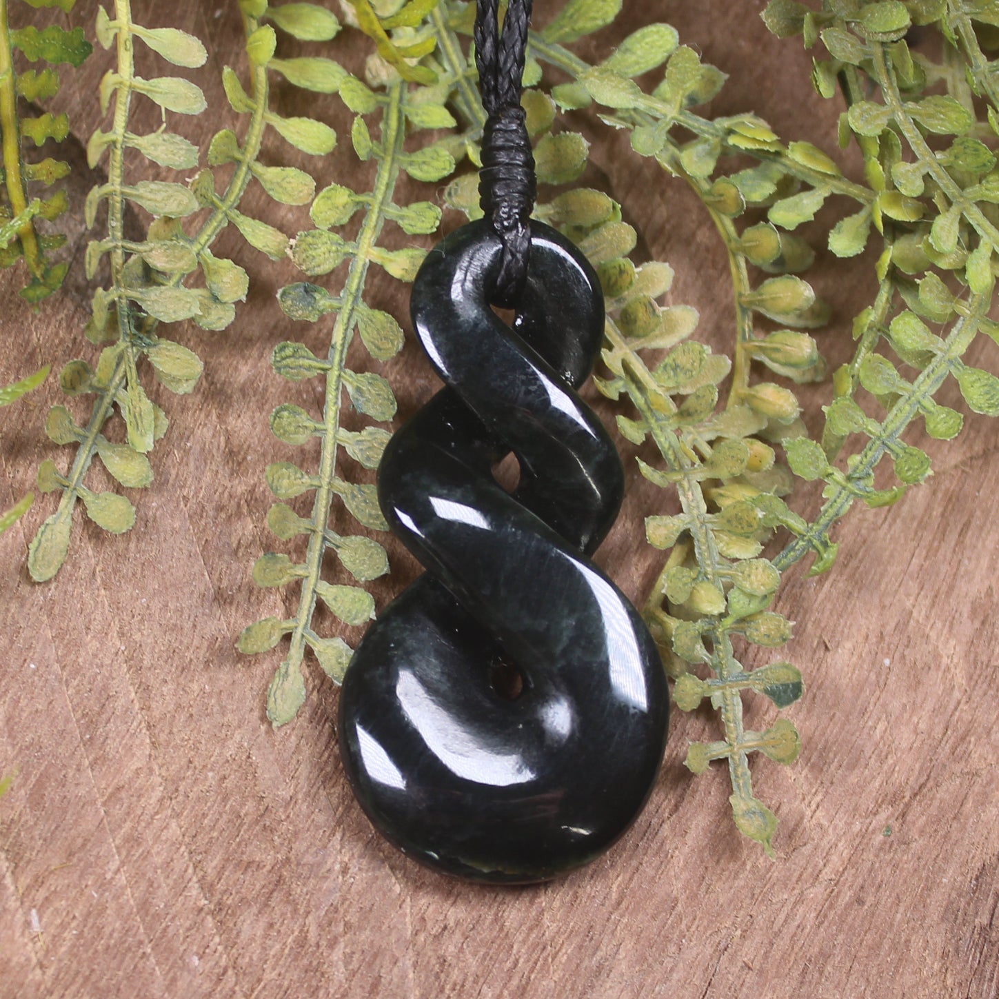 Twist carved from Kawakawa Pounamu - NZ Greenstone