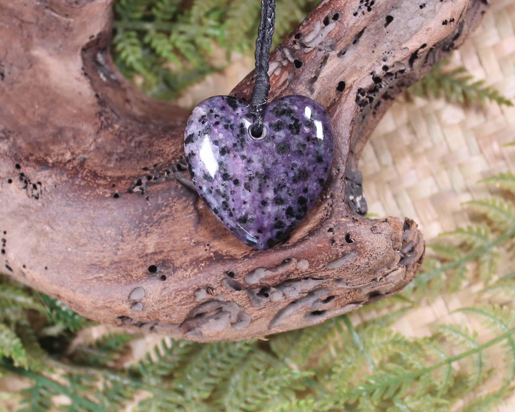 Heart pendant carved from Russian Charoite