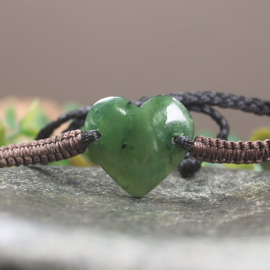 Adjustable cord bracelet with Kawakawa Pounamu