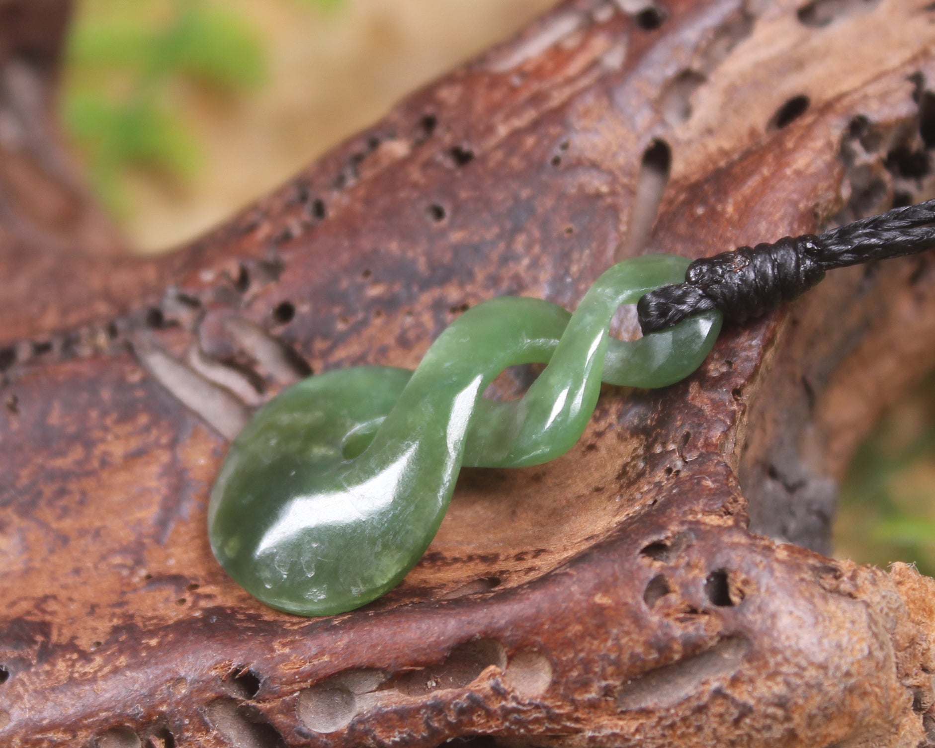 Twist or Pikorua carved from Hapopo Pounamu - NZ Greenstone