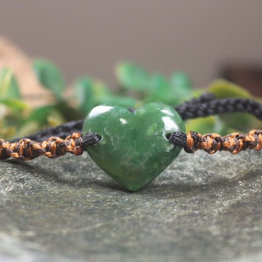 Adjustable cord bracelet with Kawakawa Pounamu