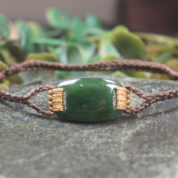 Adjustable cord bracelet with Kawakawa Pounamu
