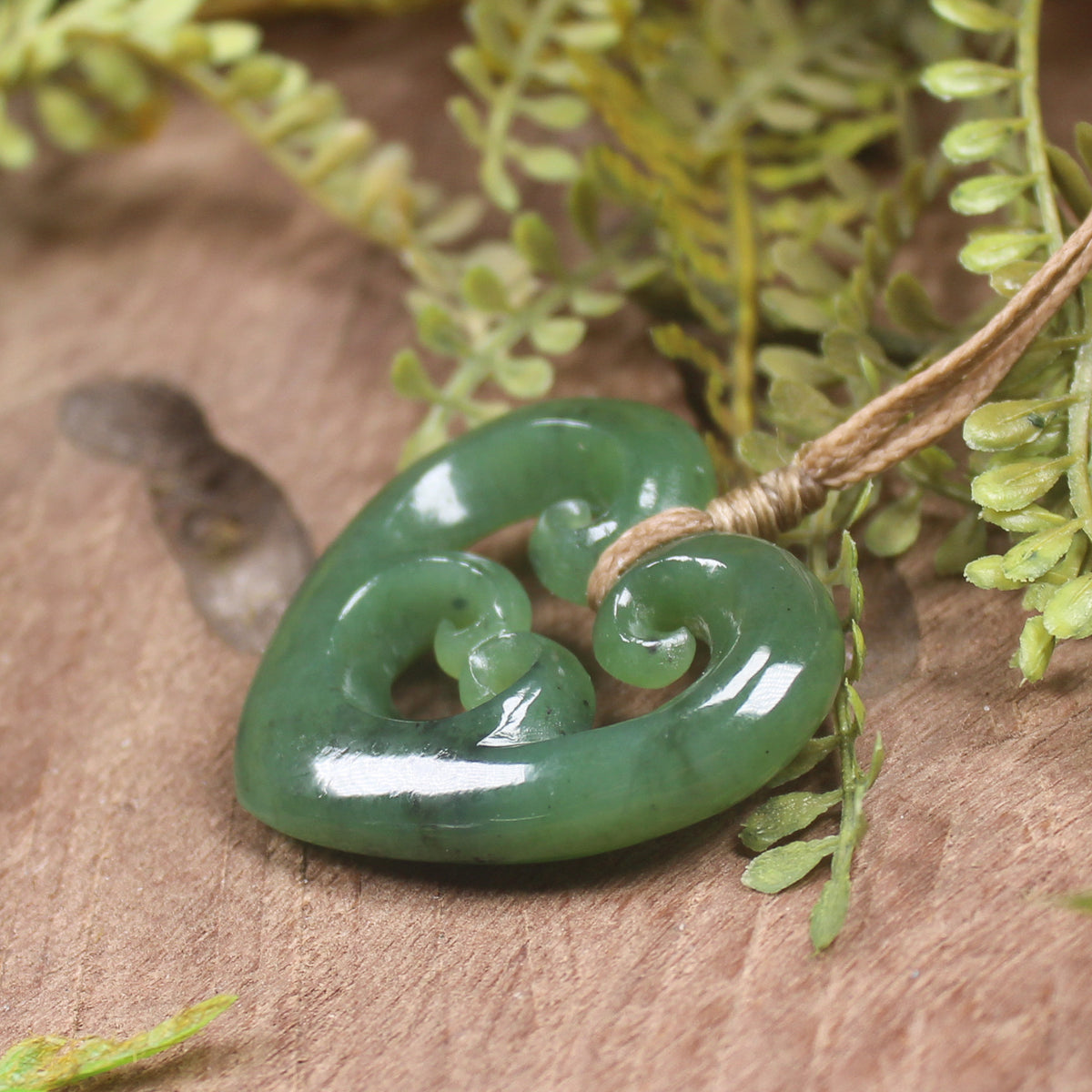 Heart with Koru carved from Hapopo Pounamu - NZ Greenstone